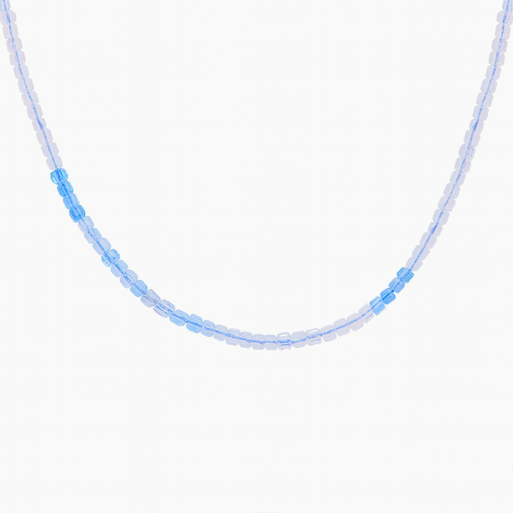 Delicate Aquamarine beaded necklace on a white background