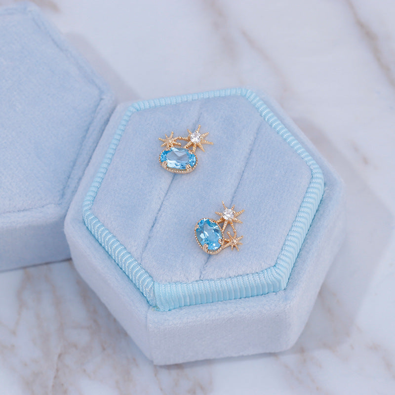 Natural Oval Swiss Blue Topaz Celestial Stud Earrings in Gold Plated Silver