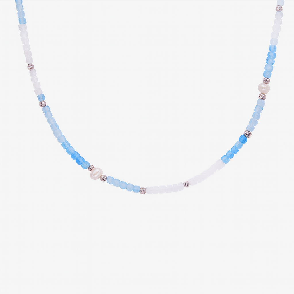 Necklace with Aquamarine and white beads on a white background