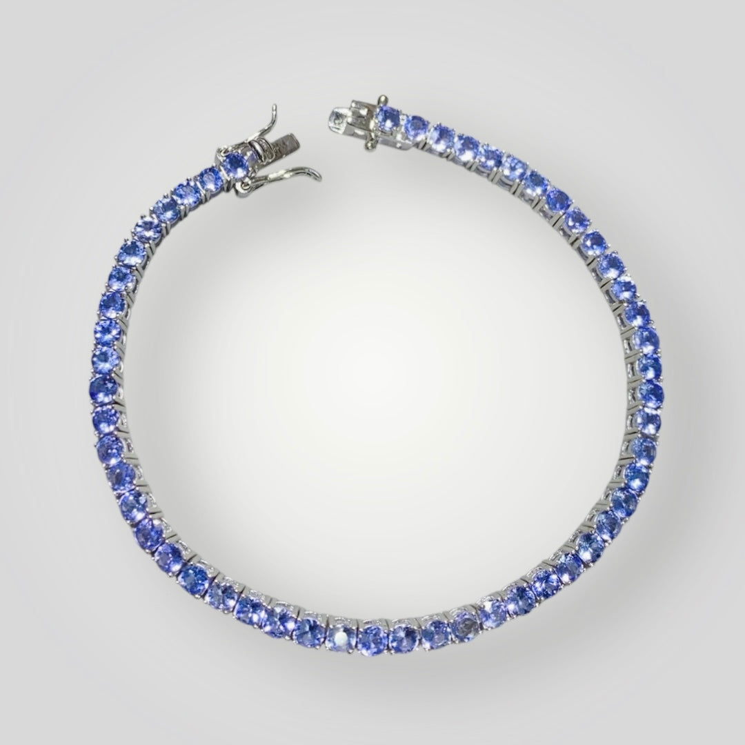 Bracelet with blue gemstones on a light gray background from Gembee Jewellery